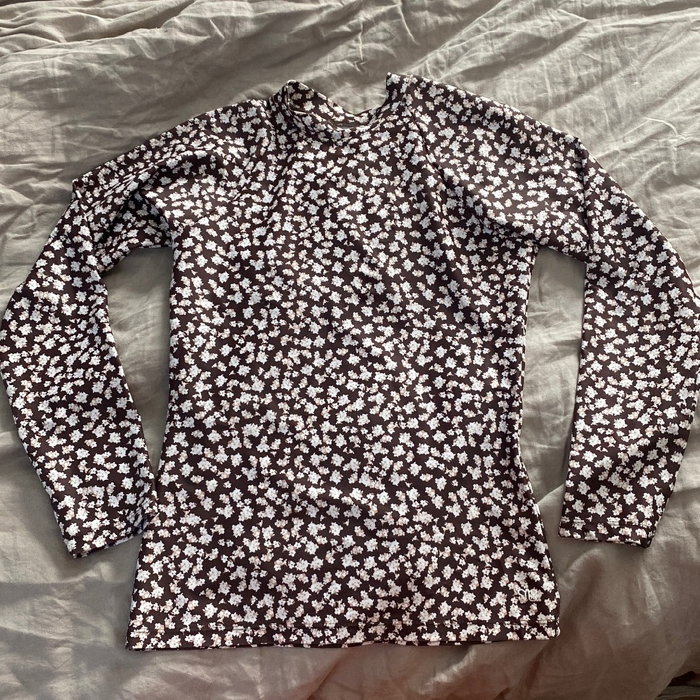 Rash guard, brown with small white flowers, worn once